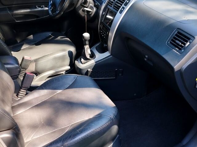 Черный Хендай Туксон, объемом двигателя 2 л и пробегом 230 тыс. км за 8000 $, фото 2 на Automoto.ua