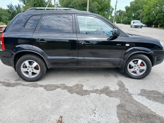 Чорний Хендай Туксон, об'ємом двигуна 2 л та пробігом 235 тис. км за 8000 $, фото 5 на Automoto.ua