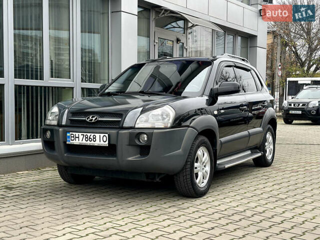 Чорний Хендай Туксон, об'ємом двигуна 2.66 л та пробігом 145 тис. км за 8900 $, фото 4 на Automoto.ua
