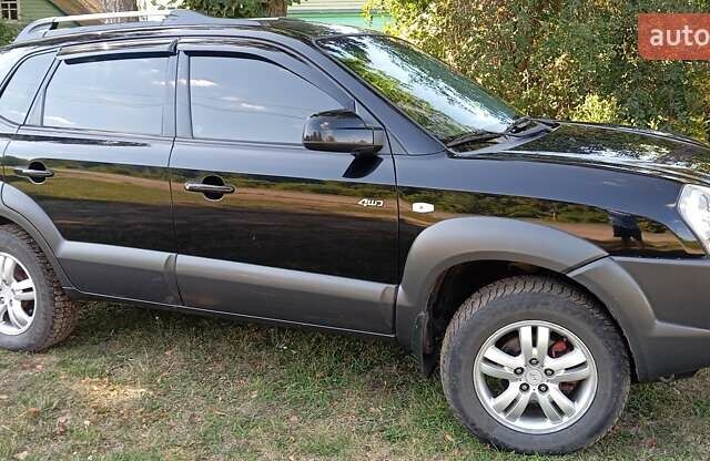 Чорний Хендай Туксон, об'ємом двигуна 1.98 л та пробігом 201 тис. км за 8800 $, фото 5 на Automoto.ua