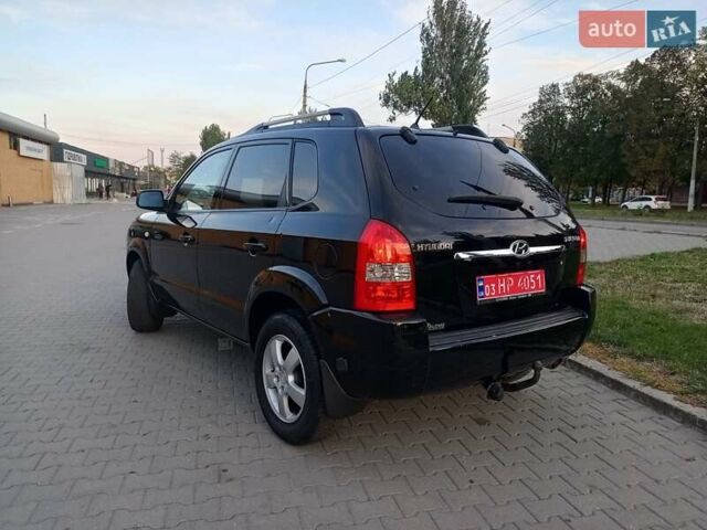 Чорний Хендай Туксон, об'ємом двигуна 1.98 л та пробігом 192 тис. км за 7950 $, фото 4 на Automoto.ua