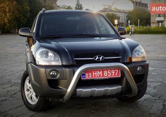 Черный Хендай Туксон, объемом двигателя 2 л и пробегом 230 тыс. км за 8600 $, фото 24 на Automoto.ua