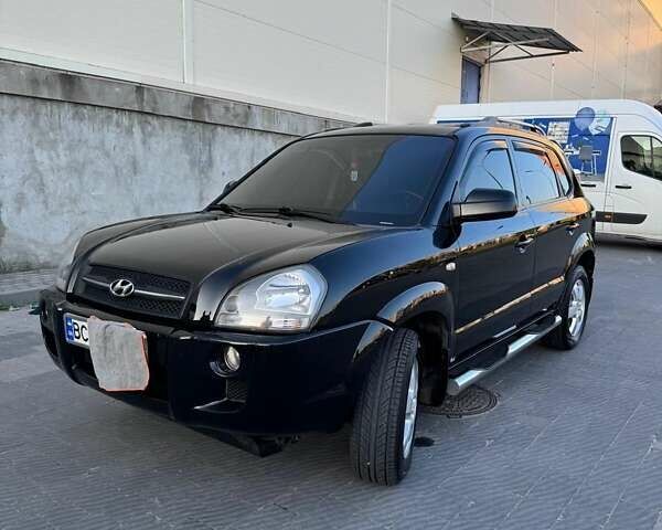 Черный Хендай Туксон, объемом двигателя 1.99 л и пробегом 231 тыс. км за 8500 $, фото 9 на Automoto.ua