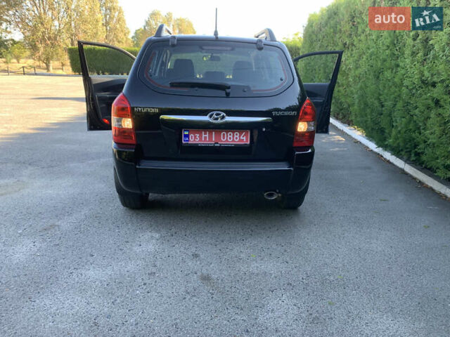 Чорний Хендай Туксон, об'ємом двигуна 2 л та пробігом 56 тис. км за 9500 $, фото 25 на Automoto.ua