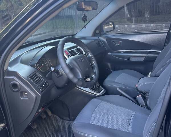 Чорний Хендай Туксон, об'ємом двигуна 1.98 л та пробігом 207 тис. км за 8500 $, фото 13 на Automoto.ua