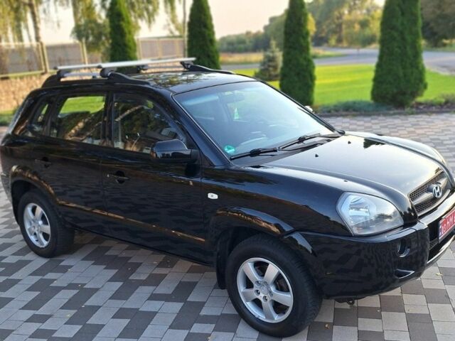 Чорний Хендай Туксон, об'ємом двигуна 2 л та пробігом 190 тис. км за 8300 $, фото 2 на Automoto.ua