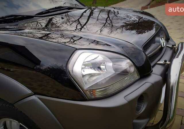 Чорний Хендай Туксон, об'ємом двигуна 2 л та пробігом 229 тис. км за 8600 $, фото 62 на Automoto.ua