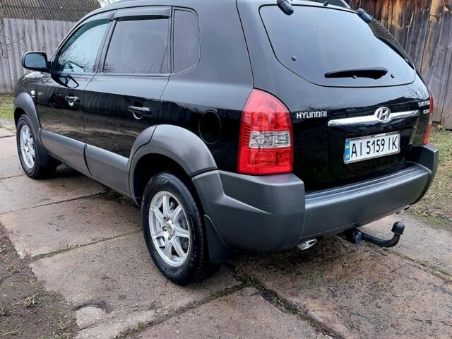 Черный Хендай Туксон, объемом двигателя 2 л и пробегом 272 тыс. км за 7500 $, фото 4 на Automoto.ua
