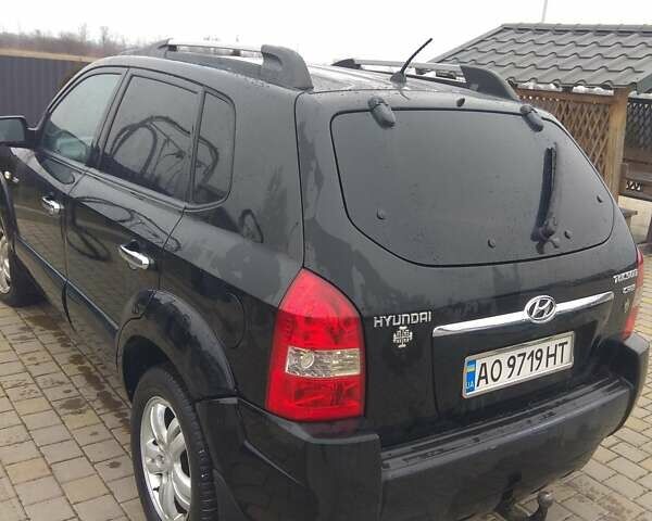Черный Хендай Туксон, объемом двигателя 2 л и пробегом 277 тыс. км за 7900 $, фото 1 на Automoto.ua