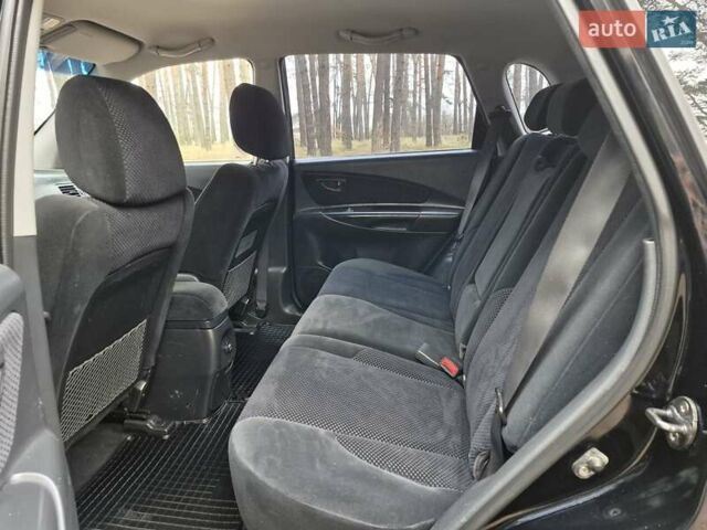 Черный Хендай Туксон, объемом двигателя 2 л и пробегом 198 тыс. км за 7800 $, фото 10 на Automoto.ua