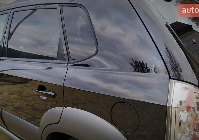 Чорний Хендай Туксон, об'ємом двигуна 2 л та пробігом 229 тис. км за 8600 $, фото 81 на Automoto.ua