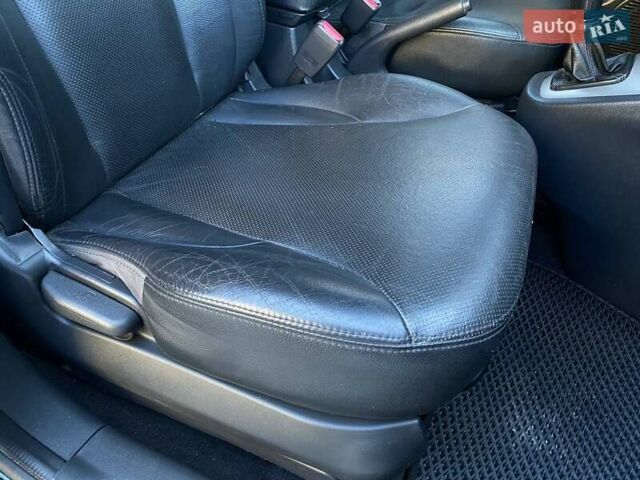 Черный Хендай Туксон, объемом двигателя 1.98 л и пробегом 286 тыс. км за 7300 $, фото 19 на Automoto.ua