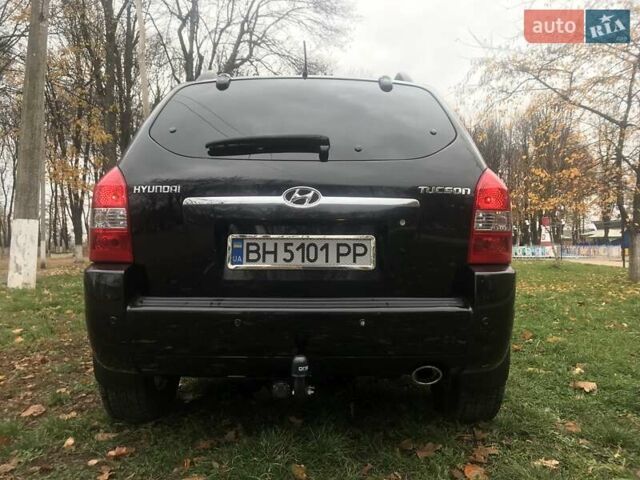 Черный Хендай Туксон, объемом двигателя 2 л и пробегом 210 тыс. км за 8999 $, фото 26 на Automoto.ua