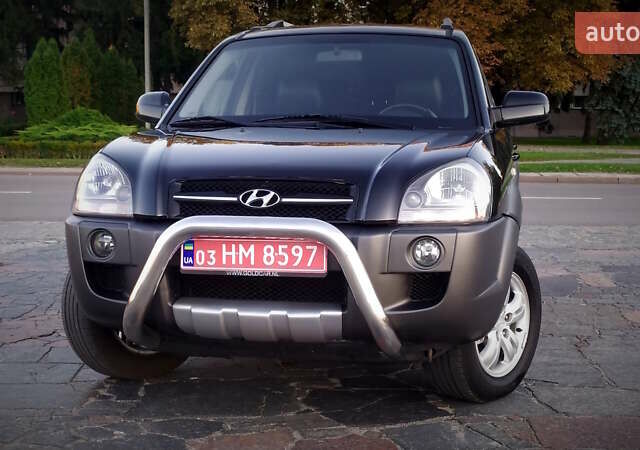 Черный Хендай Туксон, объемом двигателя 2 л и пробегом 230 тыс. км за 8600 $, фото 89 на Automoto.ua