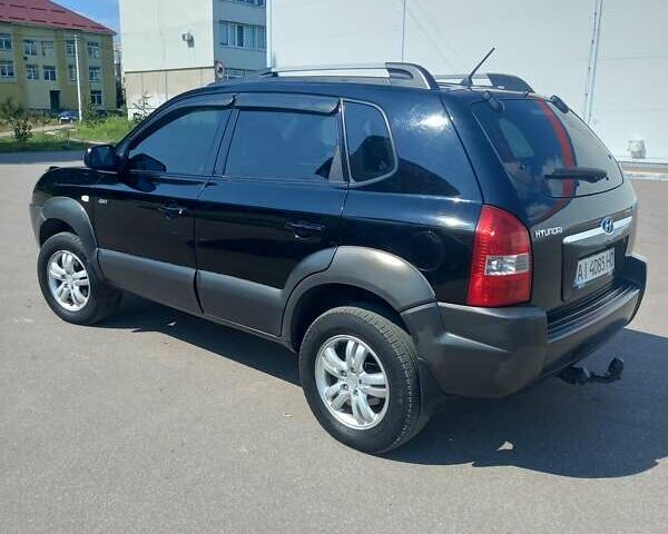 Чорний Хендай Туксон, об'ємом двигуна 1.98 л та пробігом 357 тис. км за 7500 $, фото 10 на Automoto.ua