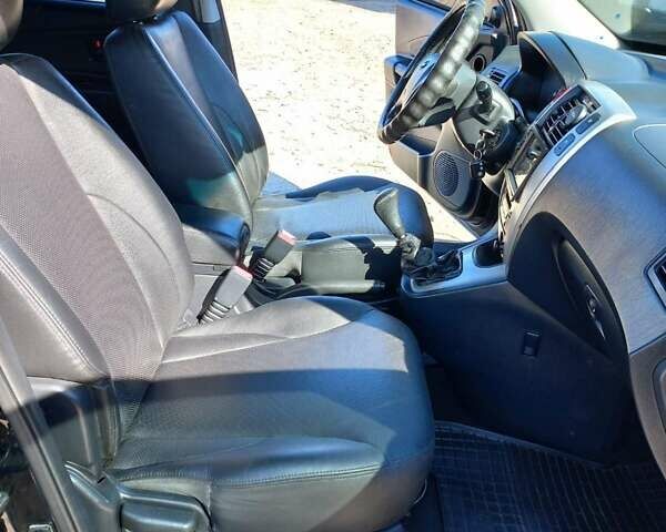 Черный Хендай Туксон, объемом двигателя 2 л и пробегом 219 тыс. км за 8500 $, фото 2 на Automoto.ua