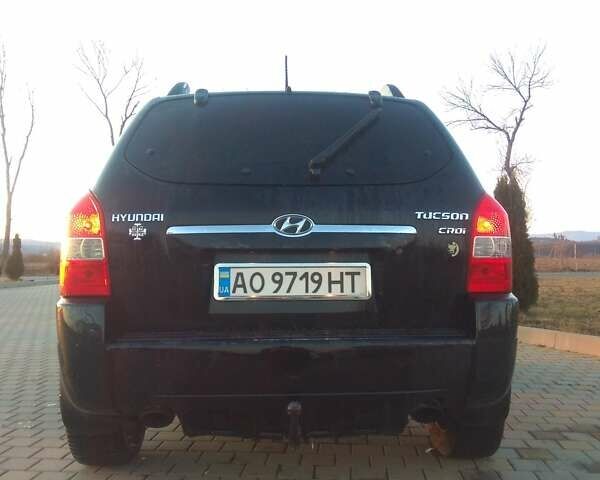 Черный Хендай Туксон, объемом двигателя 2 л и пробегом 277 тыс. км за 7900 $, фото 3 на Automoto.ua