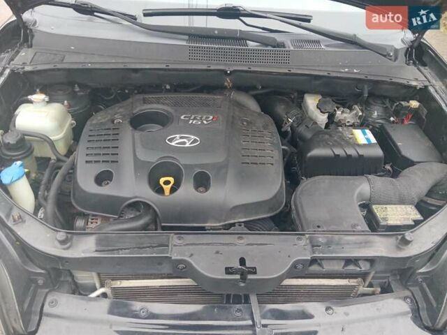 Черный Хендай Туксон, объемом двигателя 1.99 л и пробегом 235 тыс. км за 9000 $, фото 12 на Automoto.ua