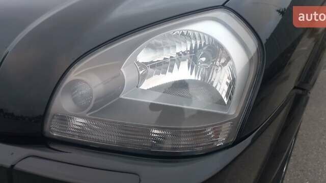 Черный Хендай Туксон, объемом двигателя 1.98 л и пробегом 155 тыс. км за 7999 $, фото 15 на Automoto.ua