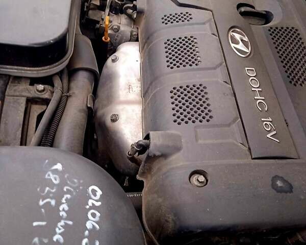 Чорний Хендай Туксон, об'ємом двигуна 1.98 л та пробігом 117 тис. км за 8450 $, фото 7 на Automoto.ua
