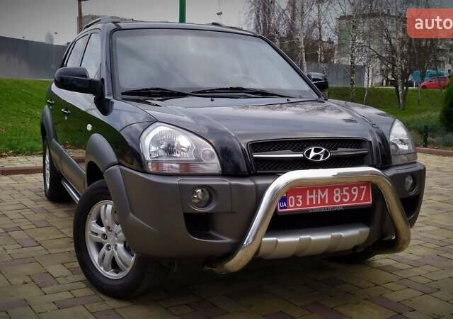 Чорний Хендай Туксон, об'ємом двигуна 2 л та пробігом 229 тис. км за 8600 $, фото 34 на Automoto.ua