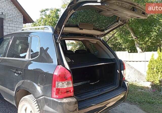 Чорний Хендай Туксон, об'ємом двигуна 1.98 л та пробігом 97 тис. км за 8600 $, фото 2 на Automoto.ua