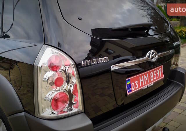 Чорний Хендай Туксон, об'ємом двигуна 2 л та пробігом 229 тис. км за 8600 $, фото 78 на Automoto.ua