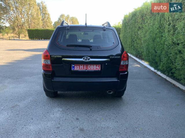 Чорний Хендай Туксон, об'ємом двигуна 2 л та пробігом 56 тис. км за 9500 $, фото 2 на Automoto.ua