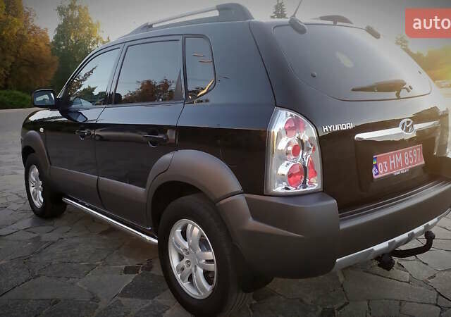 Черный Хендай Туксон, объемом двигателя 2 л и пробегом 230 тыс. км за 8600 $, фото 44 на Automoto.ua