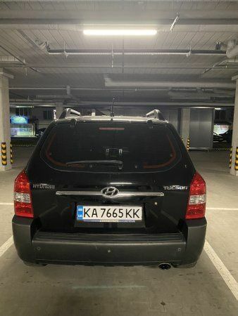 Черный Хендай Туксон, объемом двигателя 2 л и пробегом 305 тыс. км за 8000 $, фото 1 на Automoto.ua