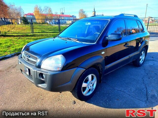 Черный Хендай Туксон, объемом двигателя 2 л и пробегом 227 тыс. км за 7750 $, фото 8 на Automoto.ua