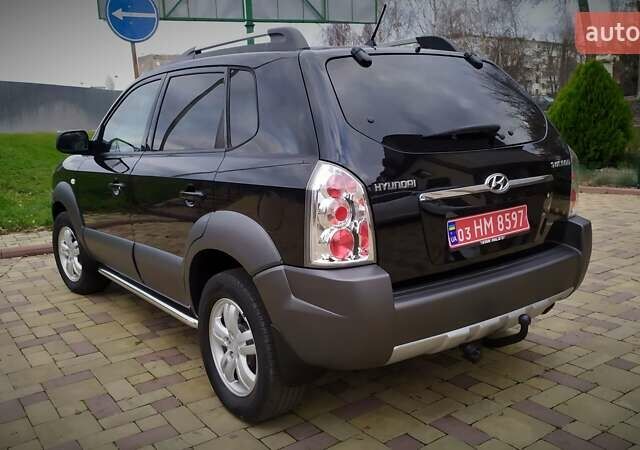 Чорний Хендай Туксон, об'ємом двигуна 2 л та пробігом 229 тис. км за 8600 $, фото 47 на Automoto.ua