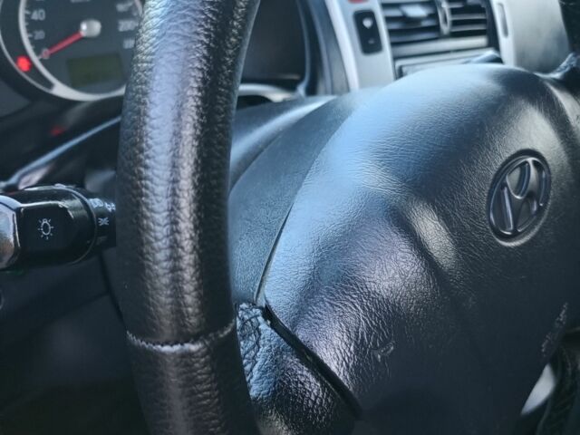 Черный Хендай Туксон, объемом двигателя 2 л и пробегом 192 тыс. км за 7950 $, фото 16 на Automoto.ua