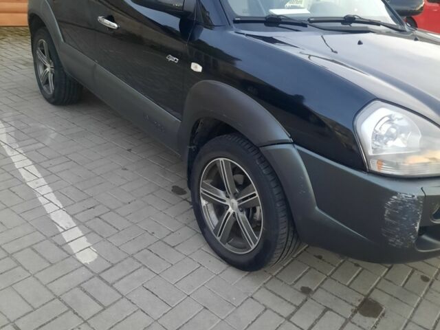 Черный Хендай Туксон, объемом двигателя 2 л и пробегом 1 тыс. км за 8500 $, фото 2 на Automoto.ua