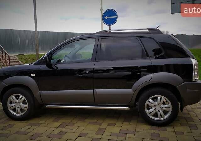 Чорний Хендай Туксон, об'ємом двигуна 2 л та пробігом 229 тис. км за 8600 $, фото 16 на Automoto.ua