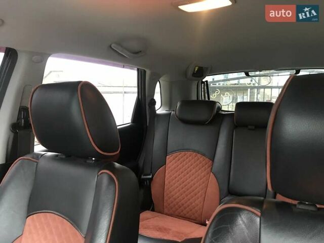 Черный Хендай Туксон, объемом двигателя 2 л и пробегом 210 тыс. км за 8999 $, фото 58 на Automoto.ua