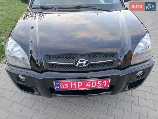 Чорний Хендай Туксон, об'ємом двигуна 1.98 л та пробігом 192 тис. км за 7950 $, фото 14 на Automoto.ua