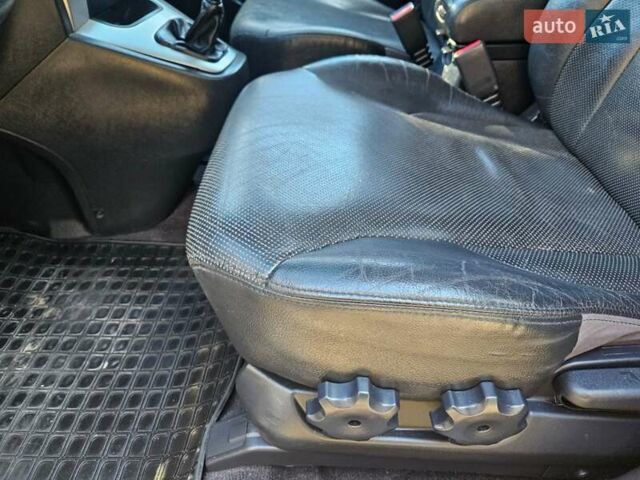 Чорний Хендай Туксон, об'ємом двигуна 2 л та пробігом 152 тис. км за 7950 $, фото 17 на Automoto.ua