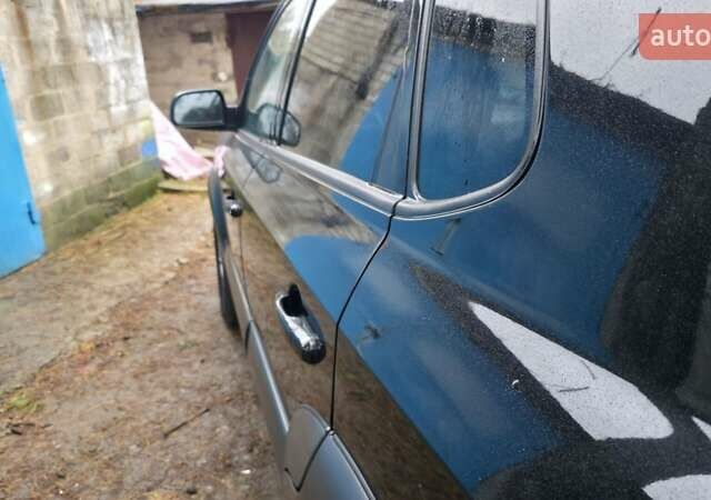 Чорний Хендай Туксон, об'ємом двигуна 2 л та пробігом 207 тис. км за 8200 $, фото 8 на Automoto.ua