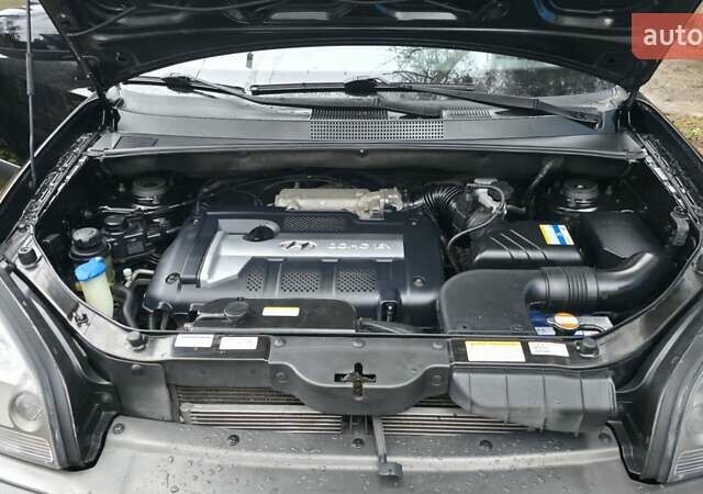 Чорний Хендай Туксон, об'ємом двигуна 2 л та пробігом 207 тис. км за 8200 $, фото 38 на Automoto.ua