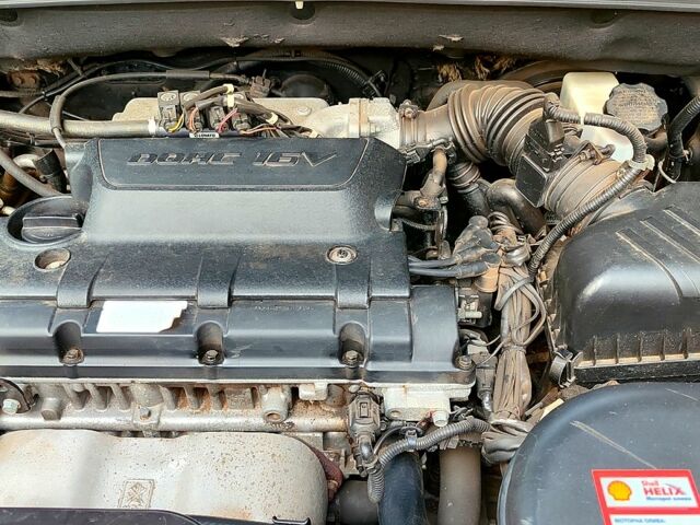 Черный Хендай Туксон, объемом двигателя 2 л и пробегом 270 тыс. км за 7800 $, фото 13 на Automoto.ua