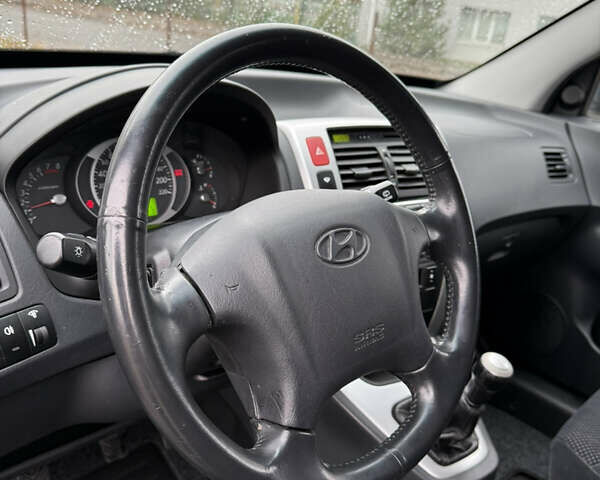 Чорний Хендай Туксон, об'ємом двигуна 2 л та пробігом 196 тис. км за 7250 $, фото 16 на Automoto.ua