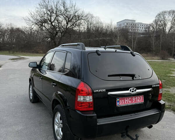 Черный Хендай Туксон, объемом двигателя 1.98 л и пробегом 159 тыс. км за 7600 $, фото 14 на Automoto.ua