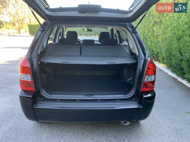 Чорний Хендай Туксон, об'ємом двигуна 2 л та пробігом 56 тис. км за 9500 $, фото 3 на Automoto.ua