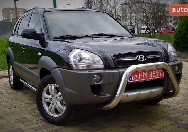 Чорний Хендай Туксон, об'ємом двигуна 2 л та пробігом 229 тис. км за 8600 $, фото 36 на Automoto.ua