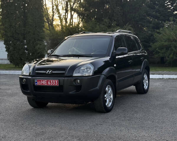 Черный Хендай Туксон, объемом двигателя 2 л и пробегом 239 тыс. км за 7850 $, фото 9 на Automoto.ua