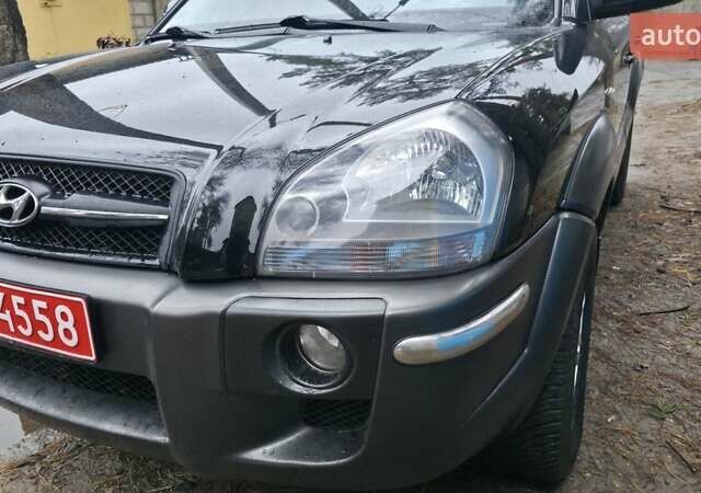 Чорний Хендай Туксон, об'ємом двигуна 2 л та пробігом 207 тис. км за 8200 $, фото 13 на Automoto.ua