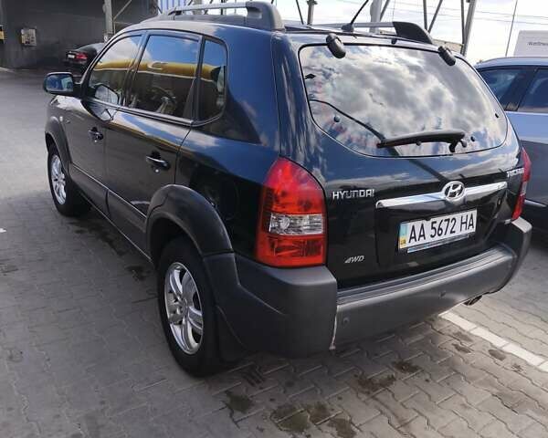Черный Хендай Туксон, объемом двигателя 2 л и пробегом 158 тыс. км за 7500 $, фото 5 на Automoto.ua