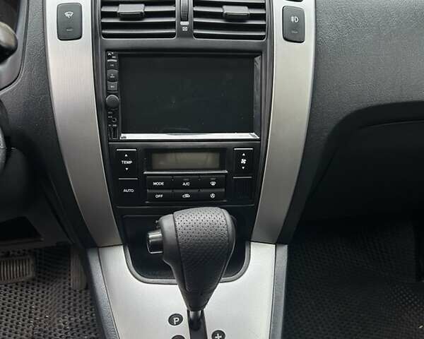 Черный Хендай Туксон, объемом двигателя 1.98 л и пробегом 147 тыс. км за 8000 $, фото 28 на Automoto.ua