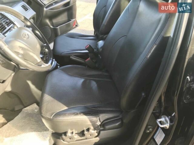 Черный Хендай Туксон, объемом двигателя 2 л и пробегом 180 тыс. км за 9200 $, фото 6 на Automoto.ua